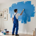 House painters Franklin County OH transforming a living room with vibrant paint, showcasing professional techniques and bright ambiance.